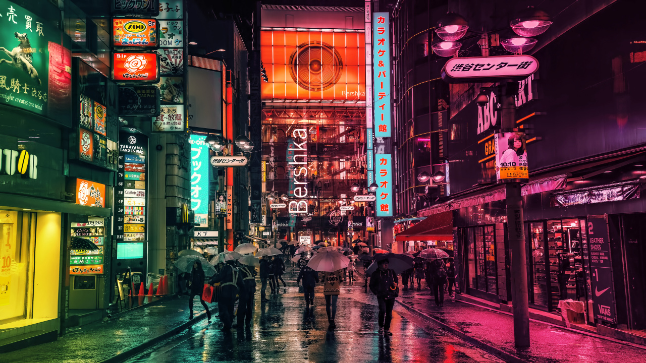 Gente Caminando en la Calle Durante la Noche. Wallpaper in 1280x720 Resolution