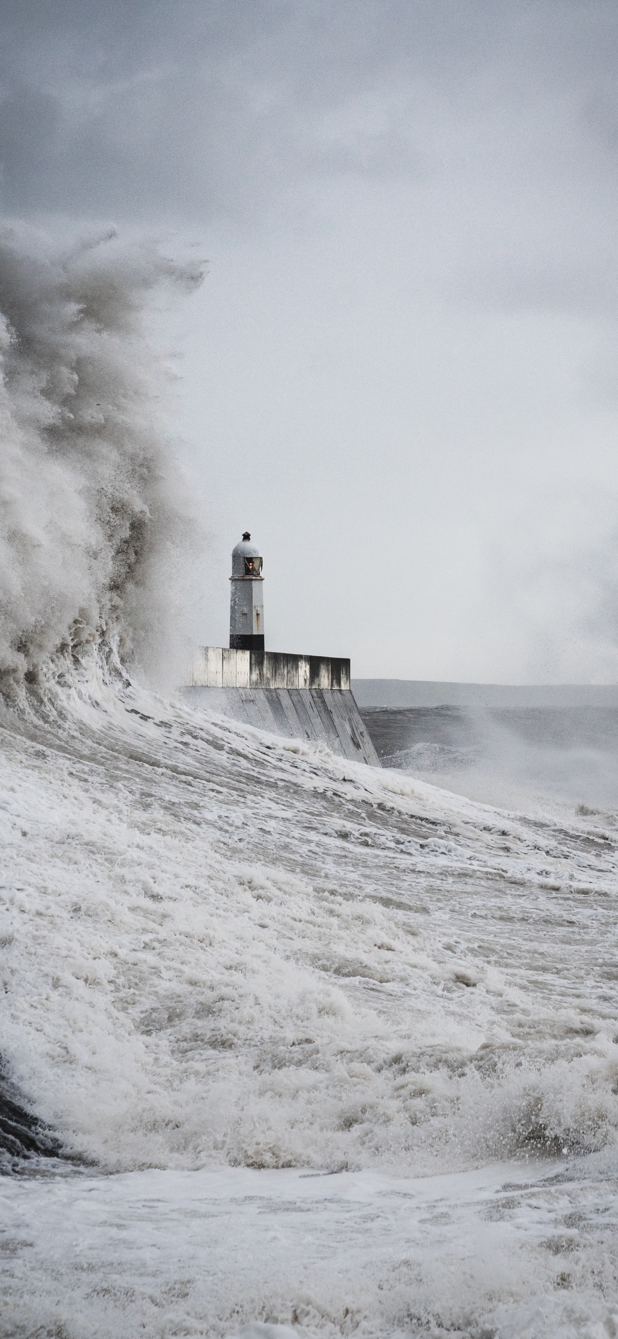 White and Black Lighthouse on White Snow Covered Ground During Daytime. Wallpaper in 1242x2688 Resolution