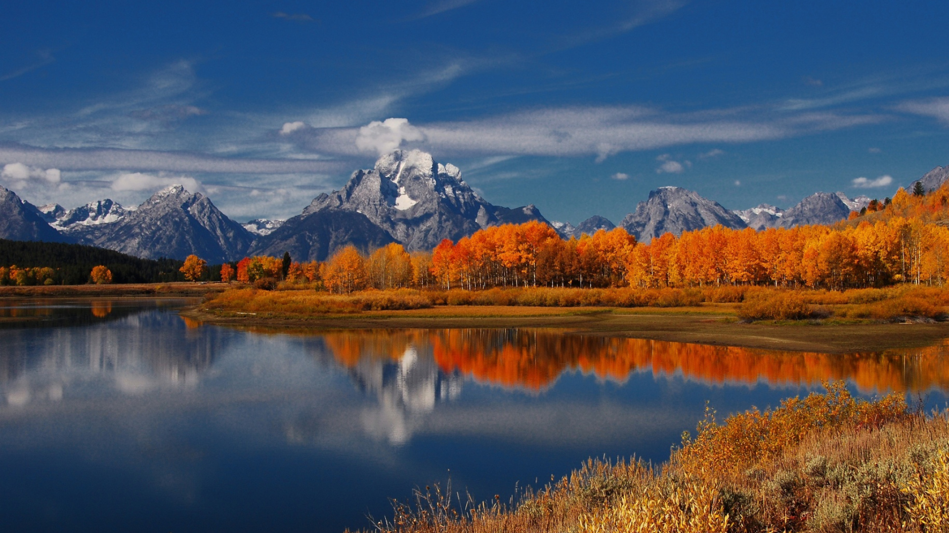 Brown Grass Field Near Lake Under Blue Sky During Daytime. Wallpaper in 1920x1080 Resolution