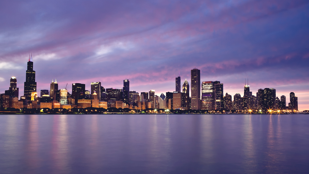 City Skyline Across Body of Water During Night Time. Wallpaper in 1280x720 Resolution