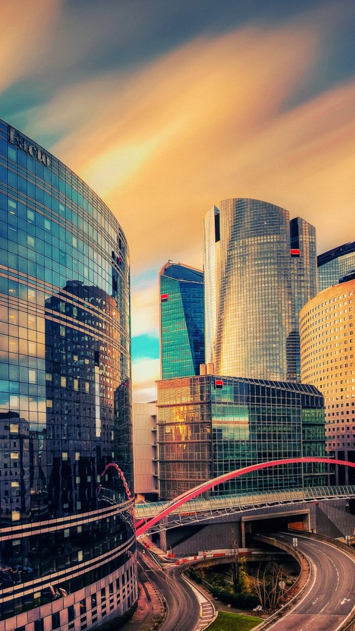 Bâtiments de la Ville Sous un Ciel Bleu Pendant la Nuit. Wallpaper in 720x1280 Resolution