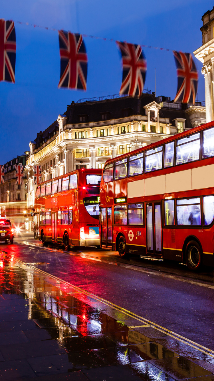 Red Double Decker Bus on Road During Night Time. Wallpaper in 750x1334 Resolution