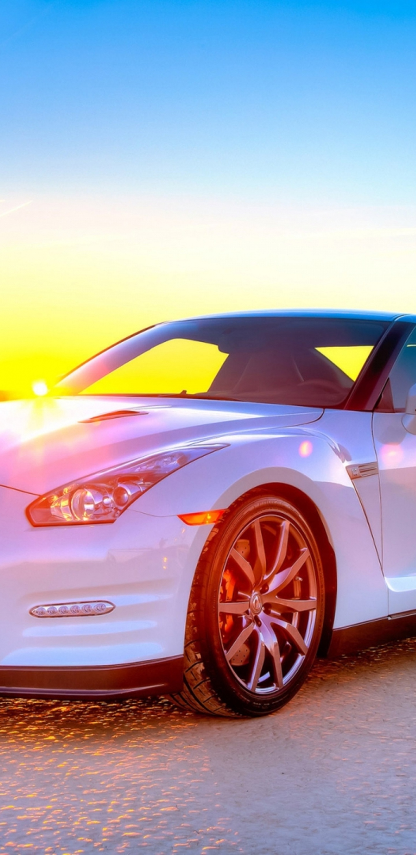 White and Black Porsche 911 on Gray Asphalt Road During Sunset. Wallpaper in 1440x2960 Resolution