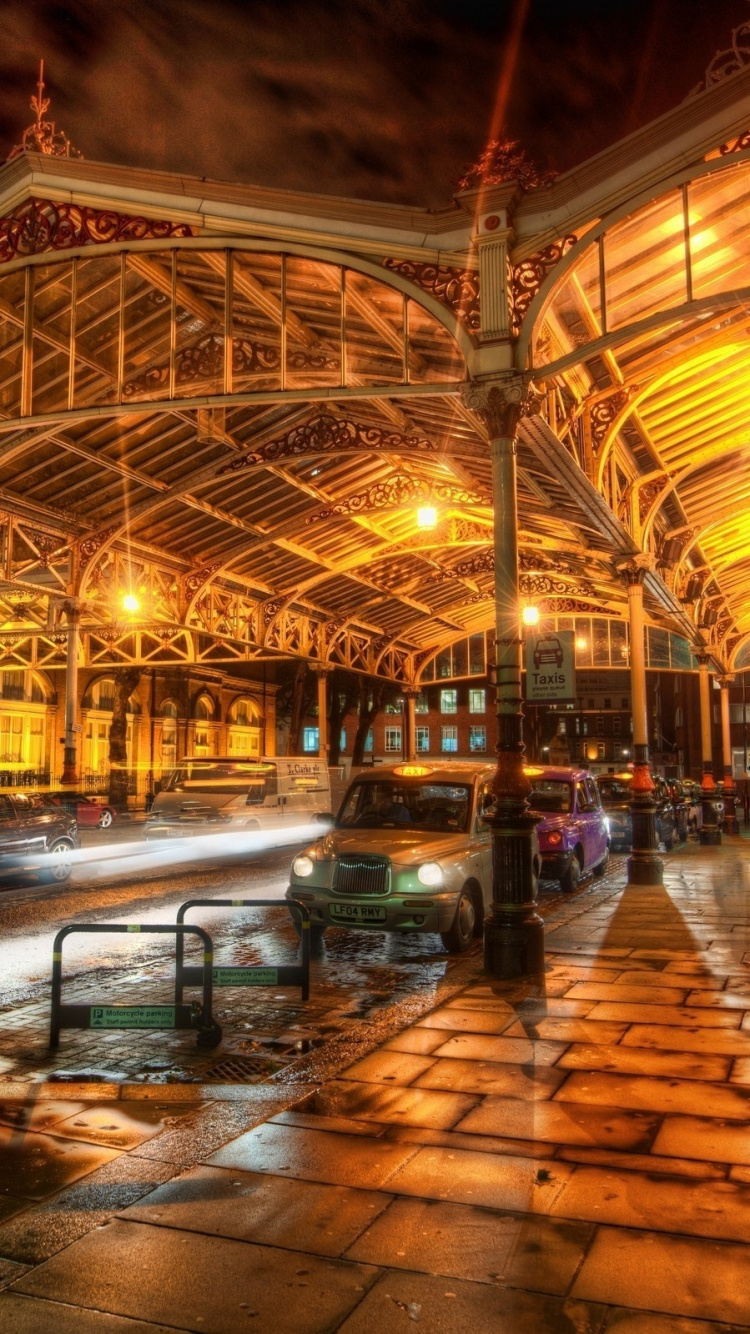 Edificio de Hormigón Marrón y Blanco Durante la Noche. Wallpaper in 750x1334 Resolution