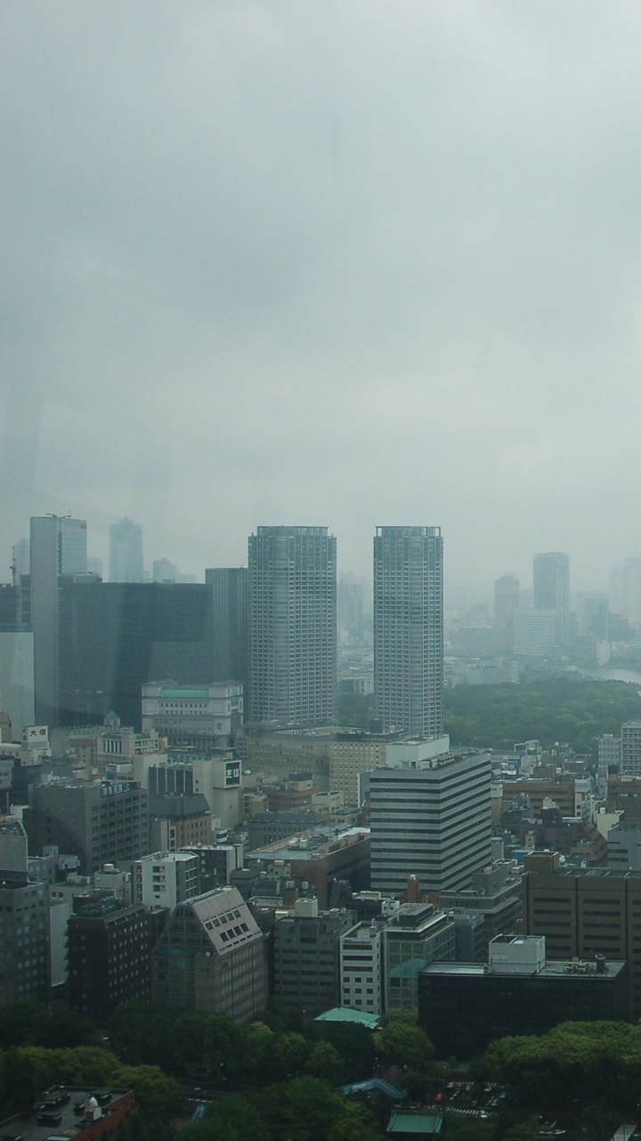 City Buildings Under White Sky During Daytime. Wallpaper in 720x1280 Resolution