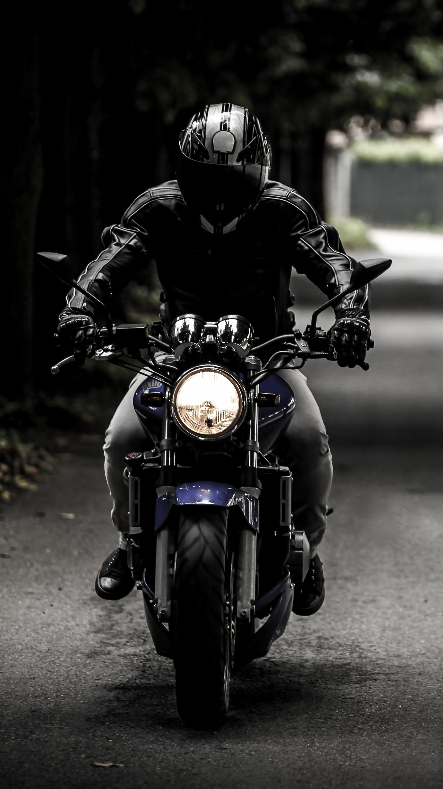 Man in Black Helmet Riding Motorcycle on Road During Daytime. Wallpaper in 1440x2560 Resolution