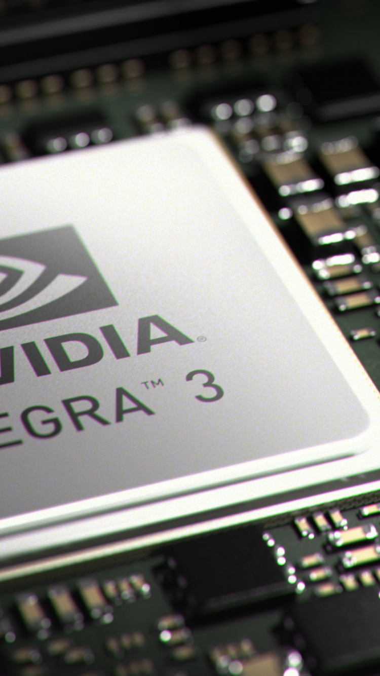 Schwarze Und Silberne Computertastatur. Wallpaper in 750x1334 Resolution