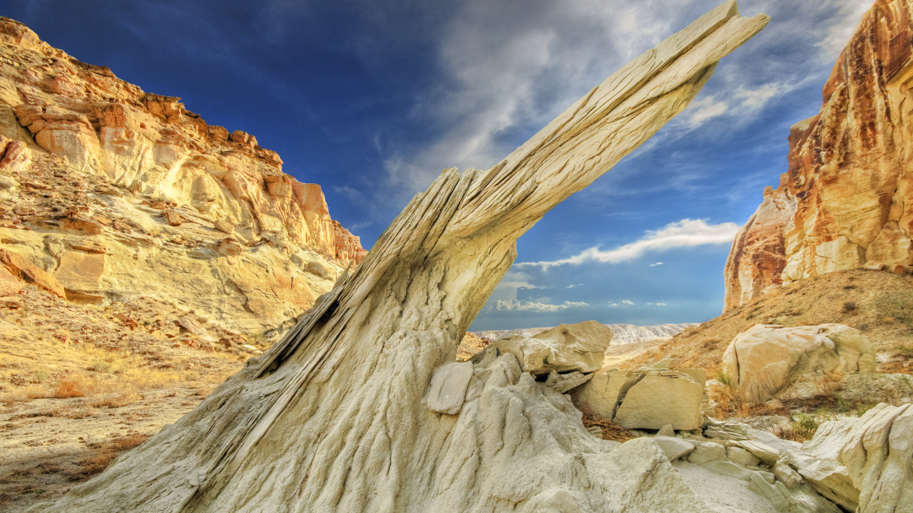Brown Rock Formation Under Blue Sky and White Clouds During Daytime. Wallpaper in 1280x720 Resolution