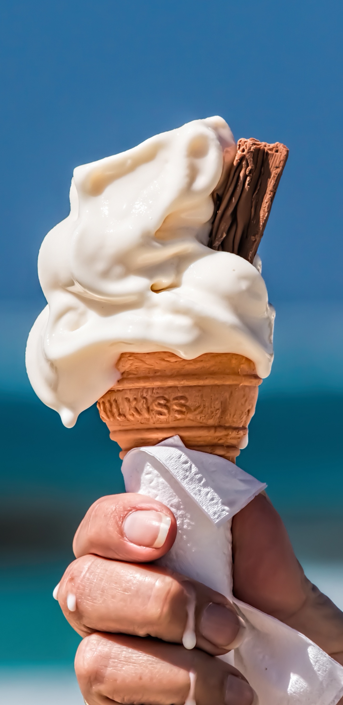 Person Holding Ice Cream Cone. Wallpaper in 1440x2960 Resolution