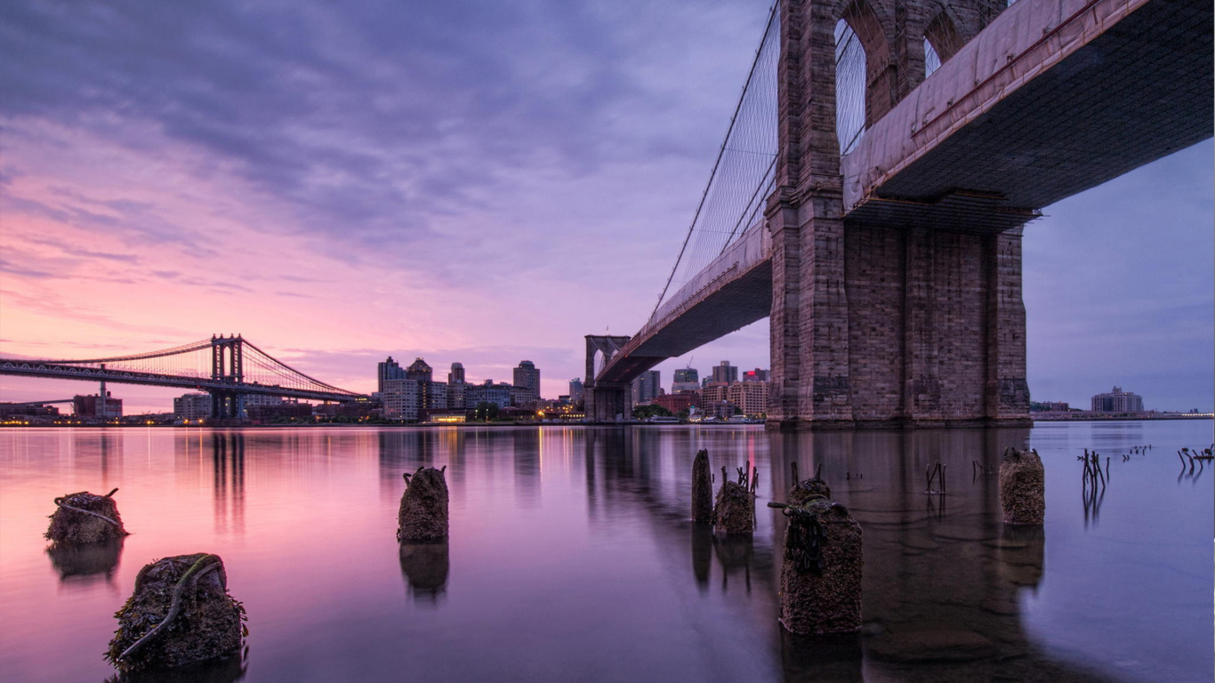 Brown Bridge Over Body of Water During Daytime. Wallpaper in 1366x768 Resolution