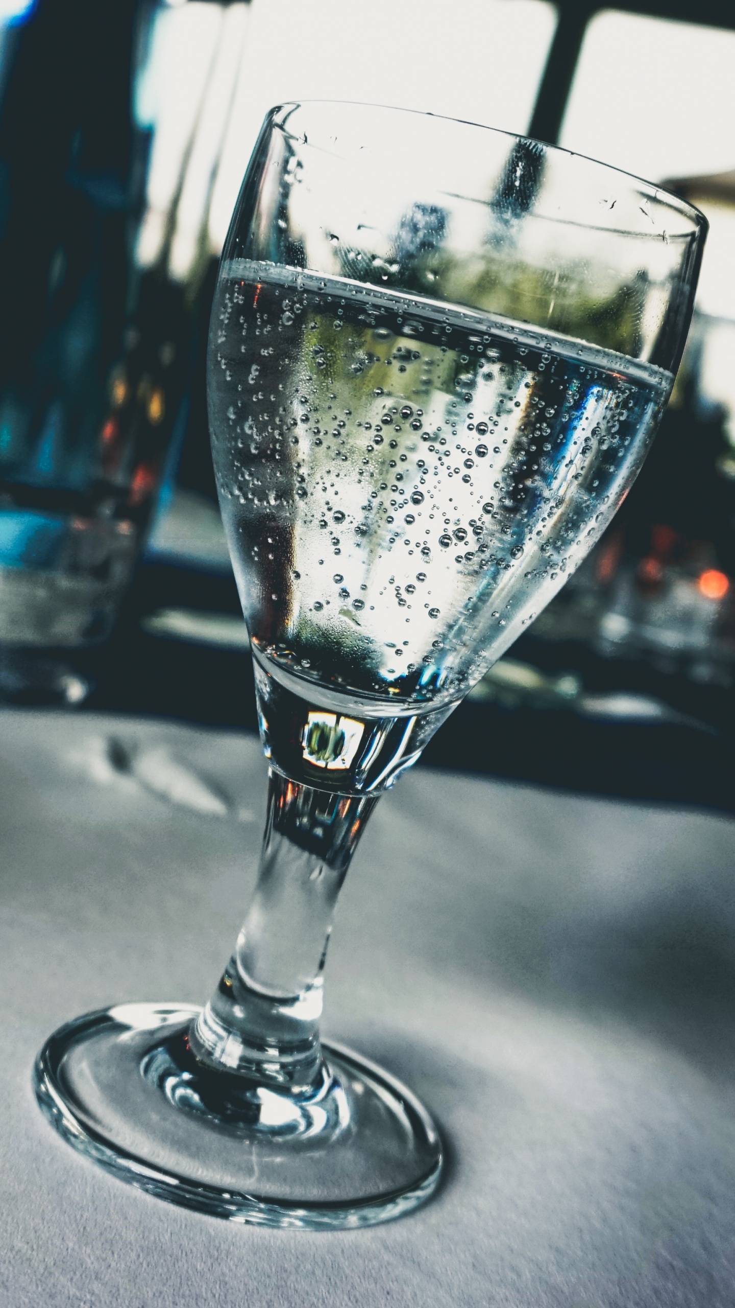 Clear Drinking Glass With Water. Wallpaper in 1440x2560 Resolution