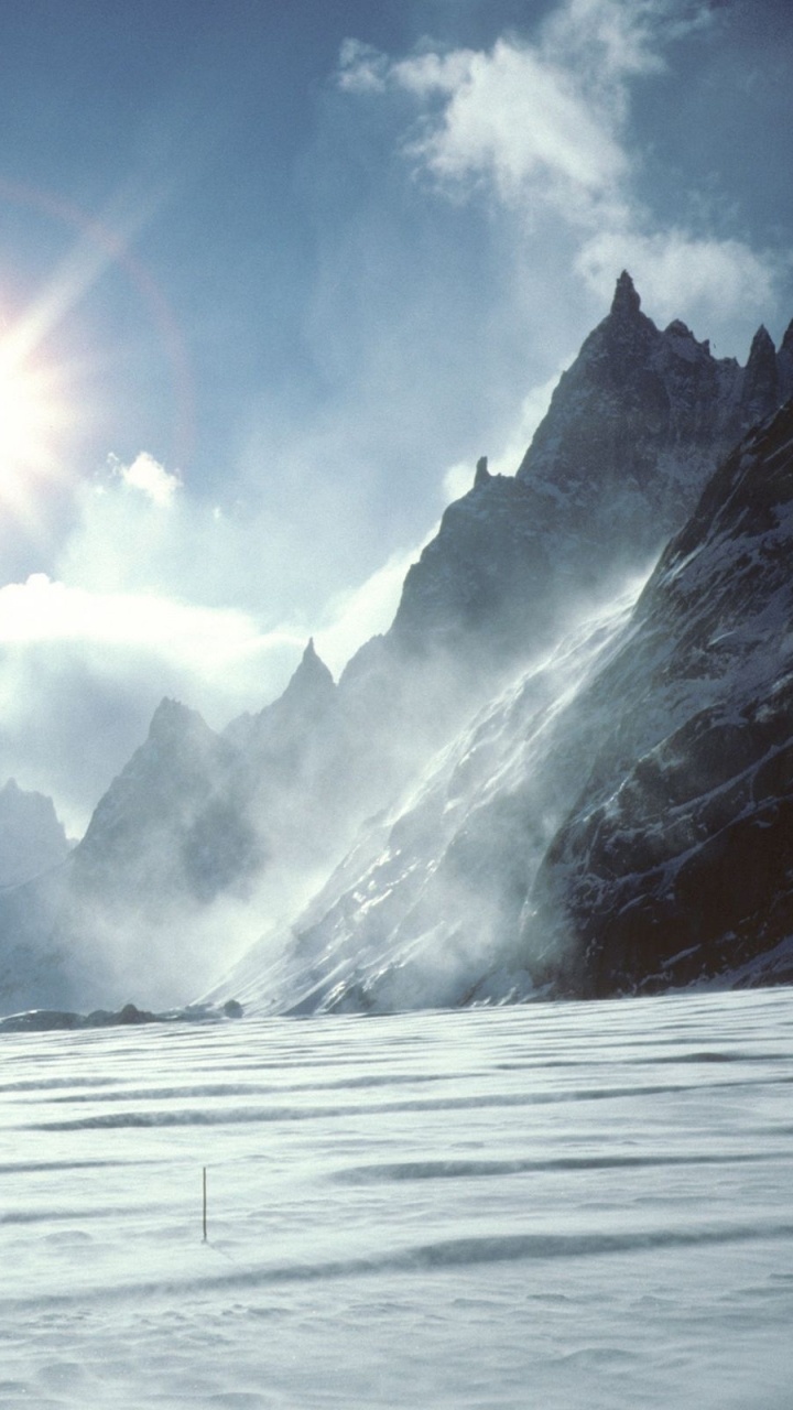 Snow Covered Mountain Under Blue Sky During Daytime. Wallpaper in 720x1280 Resolution