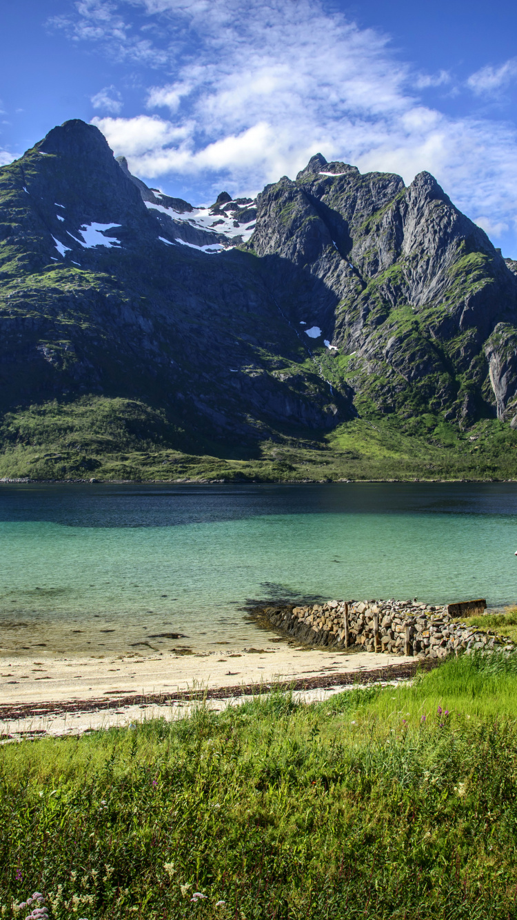 Brown Wooden House Near Body of Water and Mountain During Daytime. Wallpaper in 750x1334 Resolution