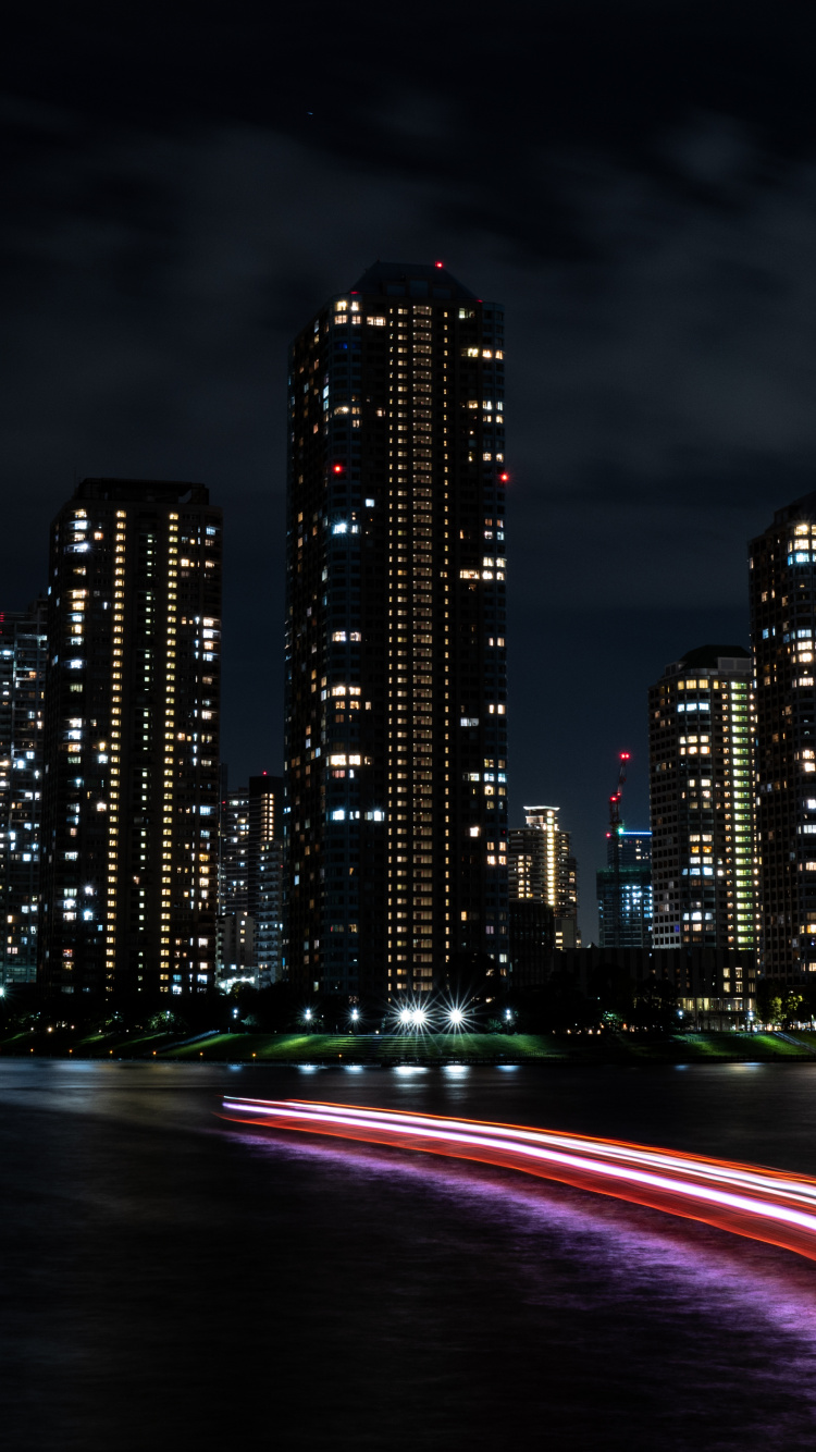 City Skyline During Night Time. Wallpaper in 750x1334 Resolution