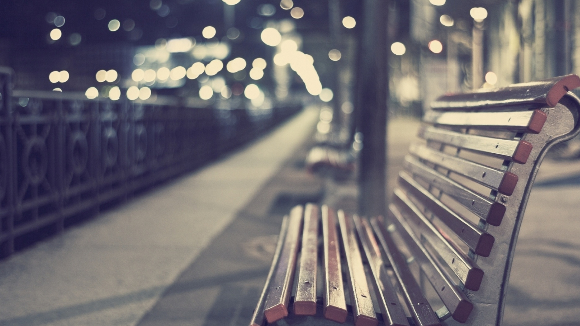 Brown Wooden Bench on Sidewalk During Night Time. Wallpaper in 1920x1080 Resolution