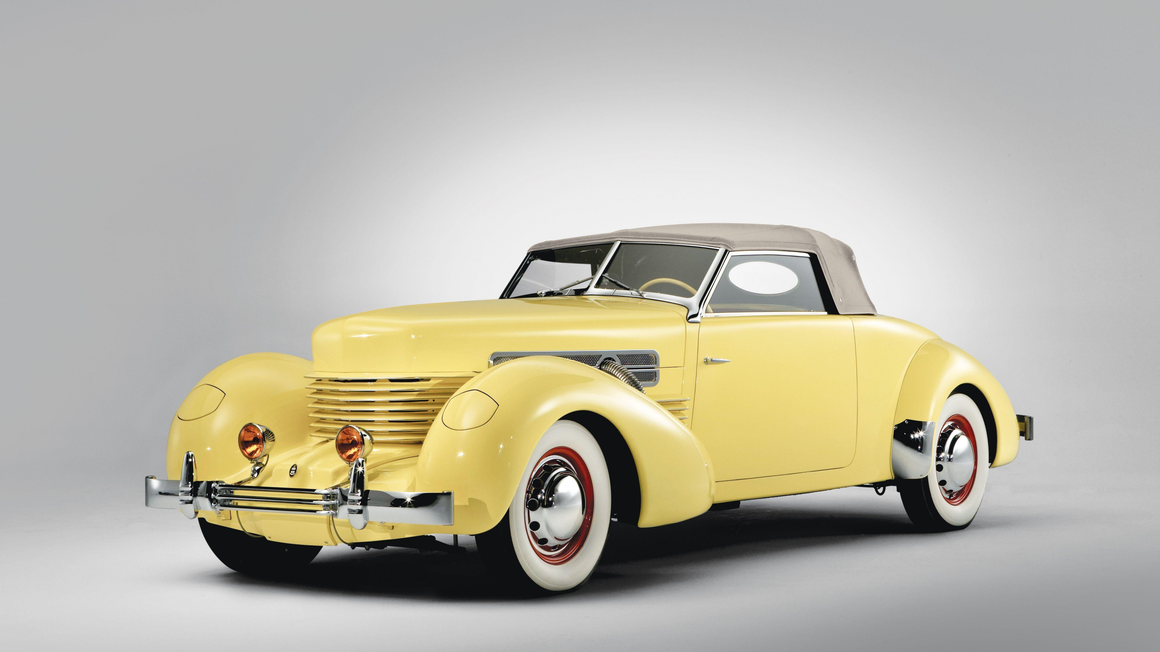 Yellow Vintage Car on White Background. Wallpaper in 3840x2160 Resolution
