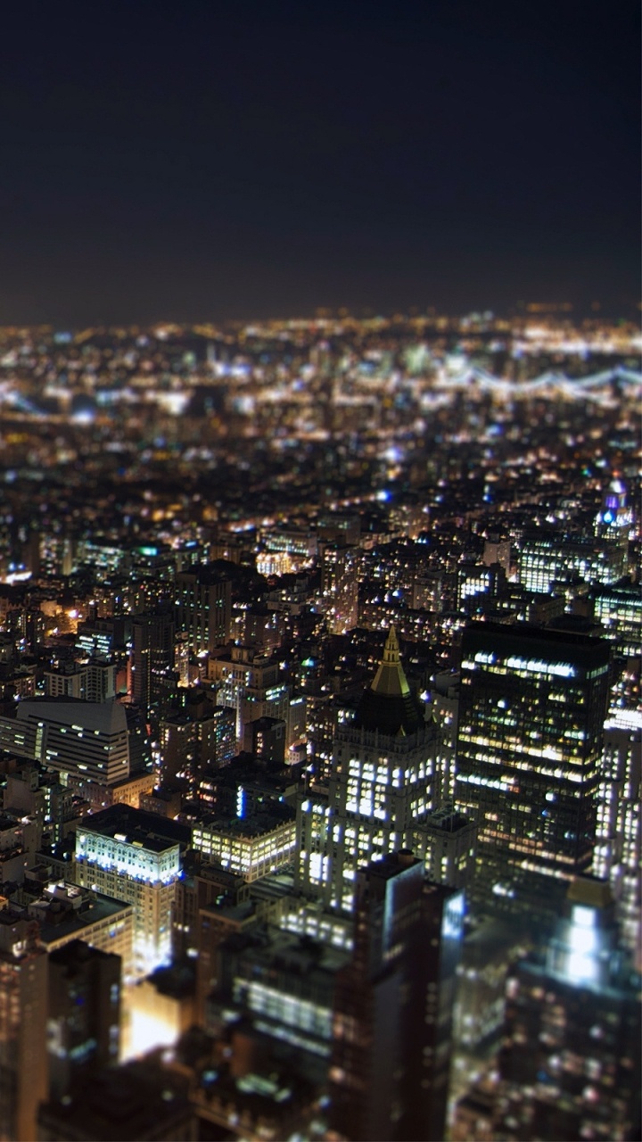Aerial View of City Buildings During Night Time. Wallpaper in 720x1280 Resolution