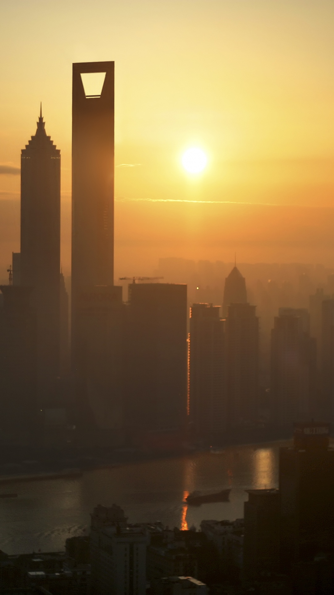 Silueta de Los Edificios de la Ciudad Durante la Puesta de Sol. Wallpaper in 1080x1920 Resolution