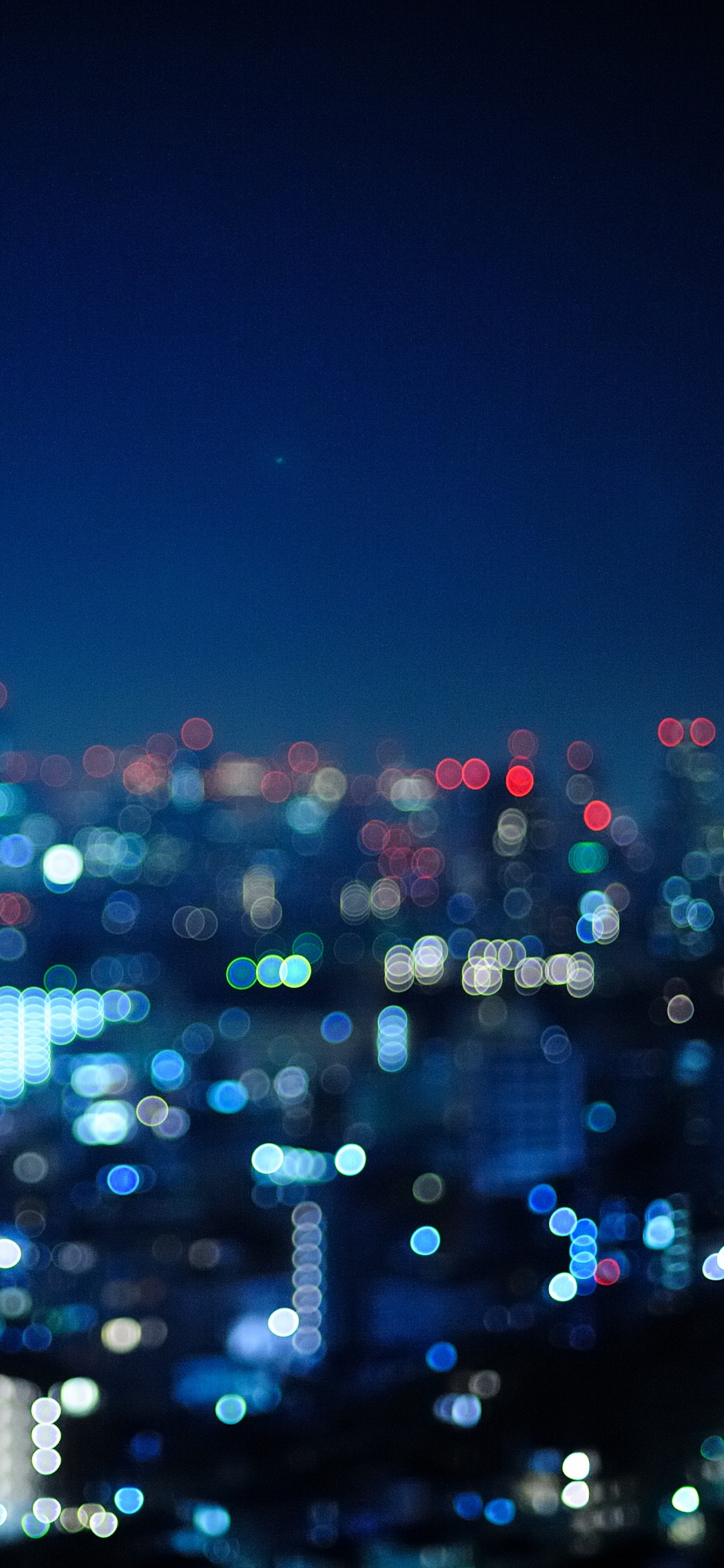 Skyline Der Stadt Bei Nacht Night. Wallpaper in 1125x2436 Resolution