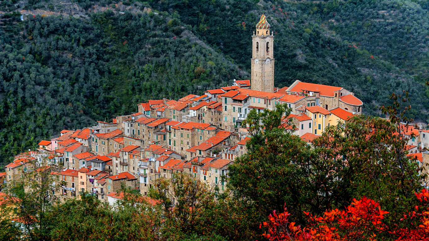 Bâtiment en Béton Marron et Blanc Près Des Arbres Verts Pendant la Journée. Wallpaper in 1366x768 Resolution
