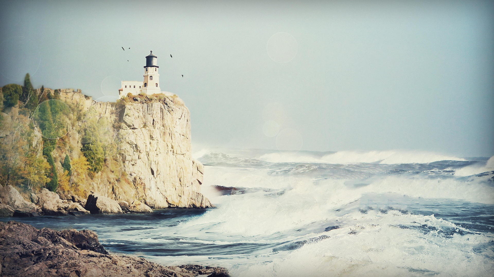 White Lighthouse on Brown Rock Formation Near Sea During Daytime. Wallpaper in 1920x1080 Resolution