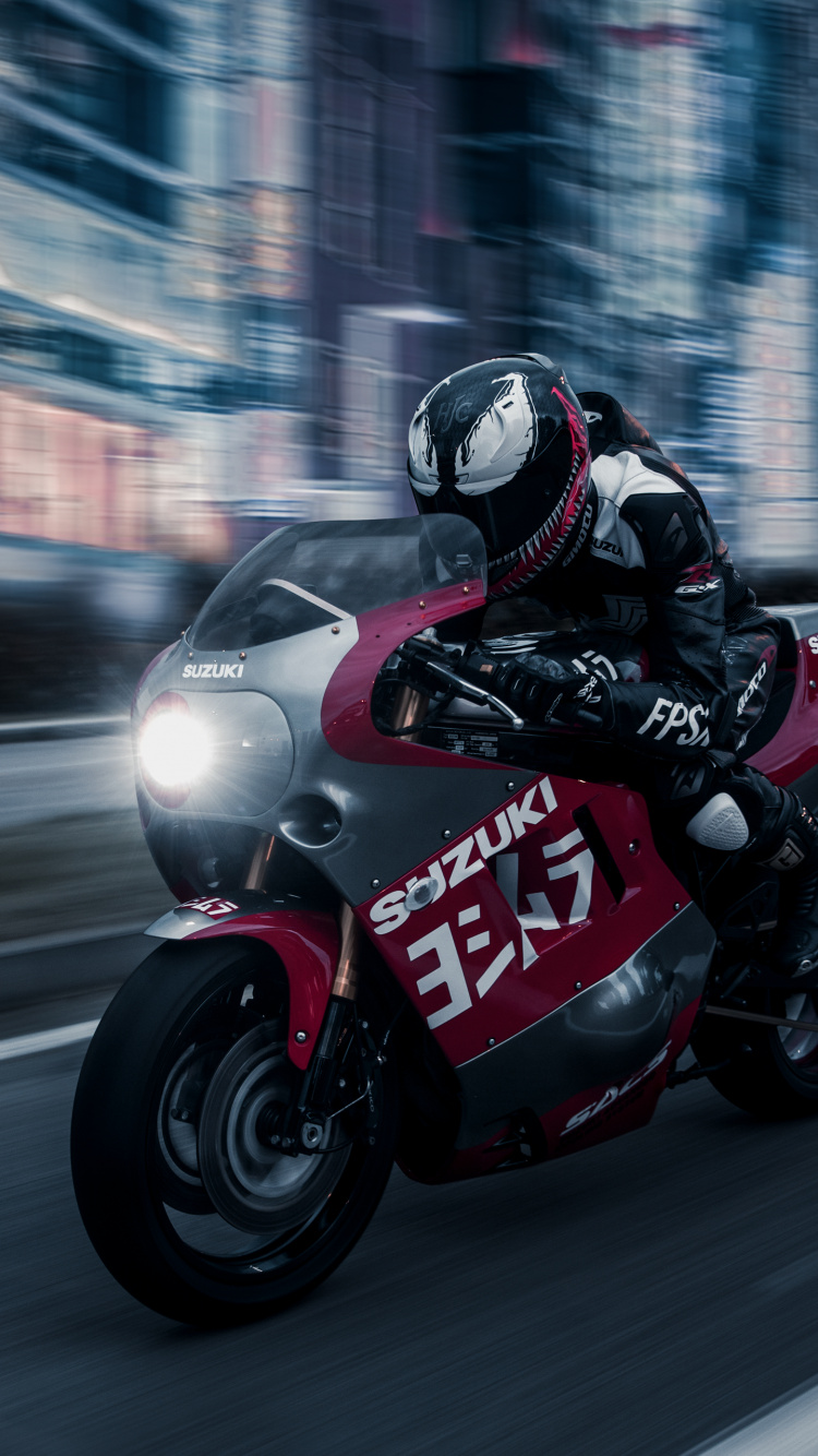 Man in Black and Red Motorcycle Helmet Riding on Red and Black Sports Bike. Wallpaper in 750x1334 Resolution