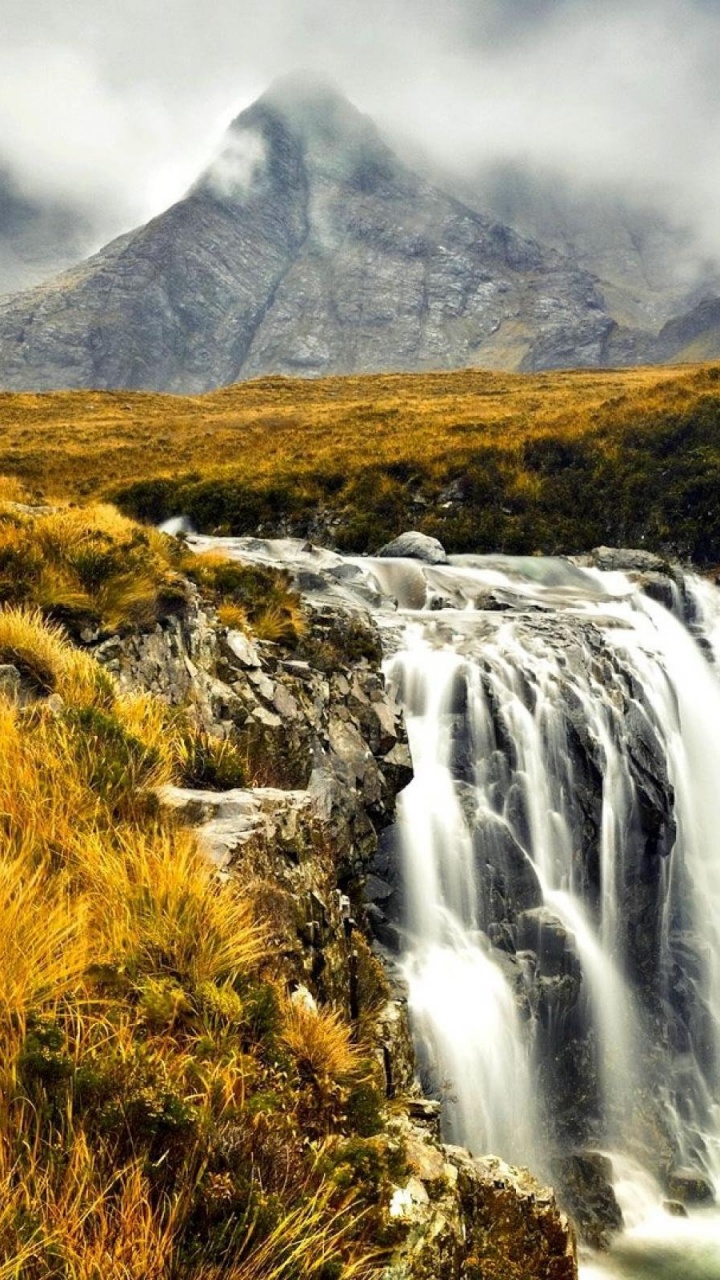 Green Grass and Brown Grass Near Waterfalls. Wallpaper in 720x1280 Resolution
