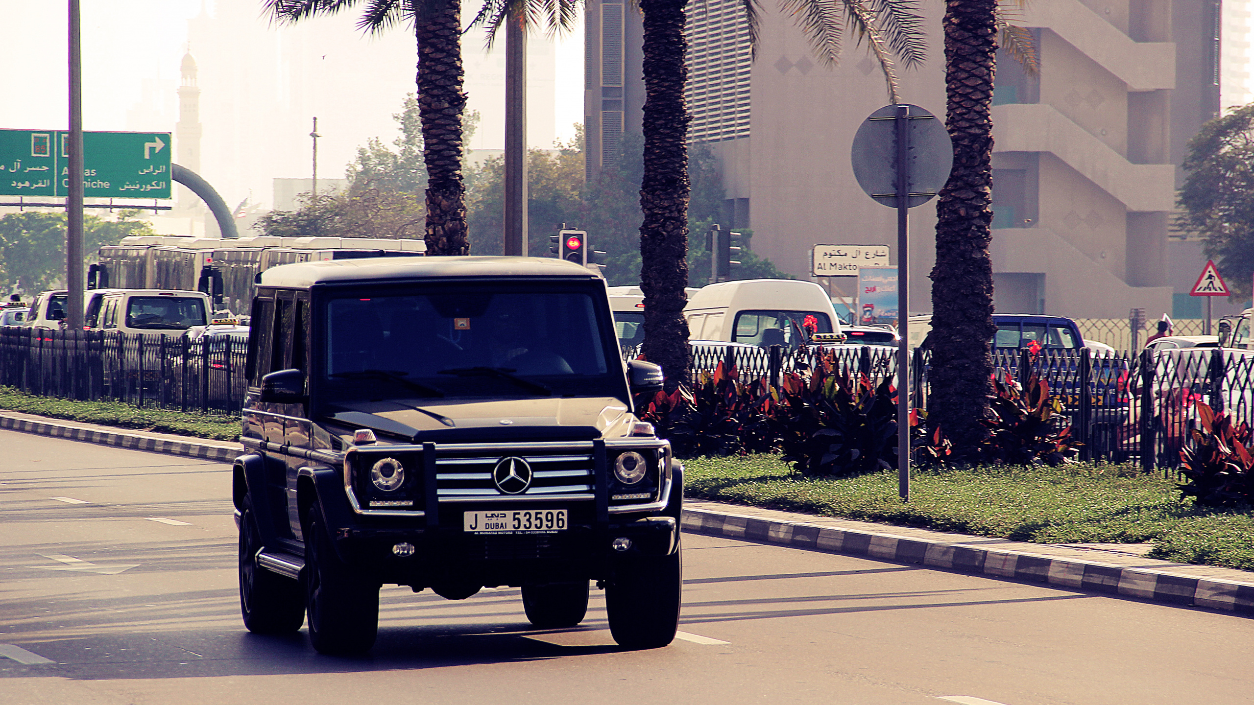 Black Jeep Wrangler on Road During Daytime. Wallpaper in 2560x1440 Resolution