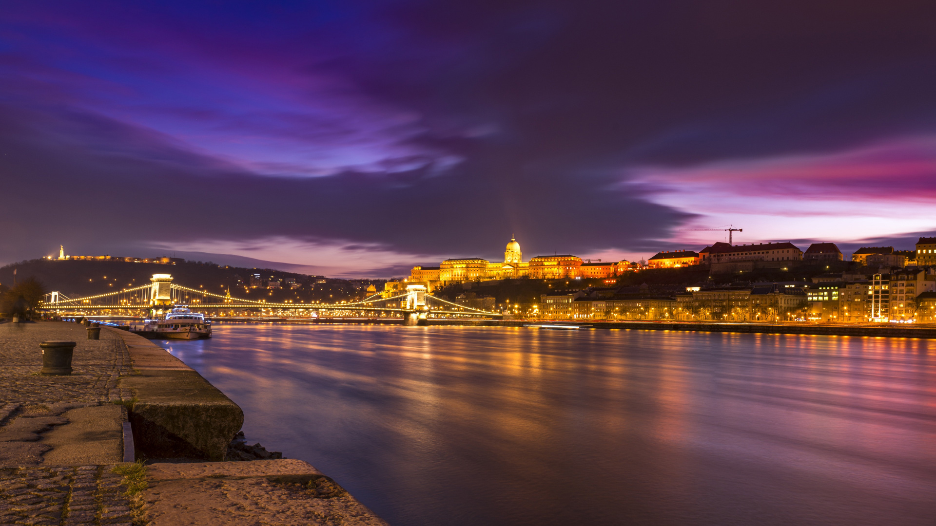 Body of Water Near City Buildings During Night Time. Wallpaper in 1920x1080 Resolution