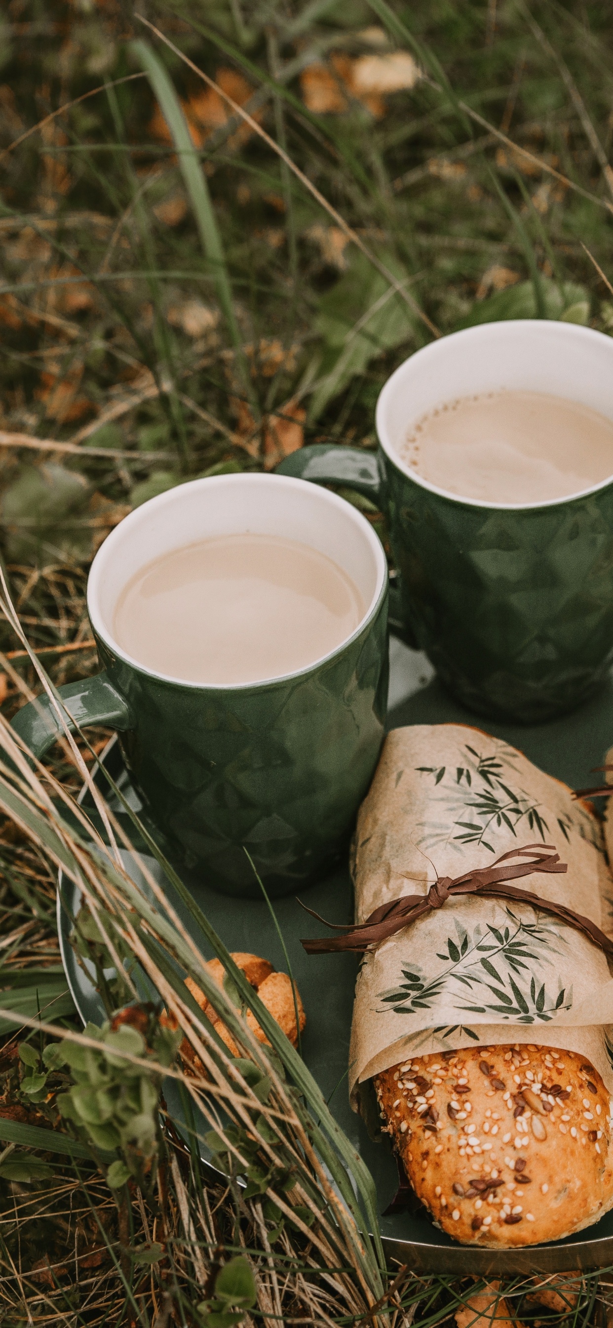 Two White Ceramic Mugs on Brown Wooden Log. Wallpaper in 1242x2688 Resolution