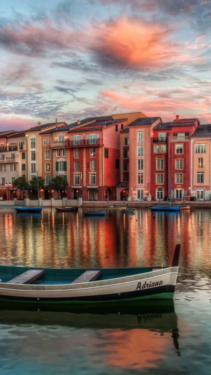 Blue and White Boat on Water Near Building During Daytime. Wallpaper in 720x1280 Resolution