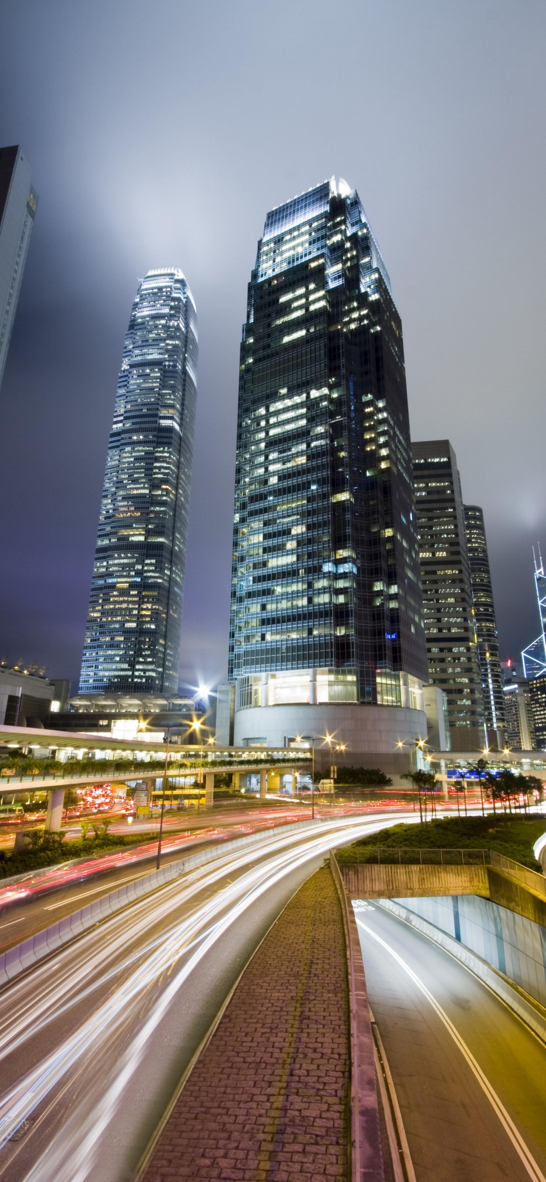 Time Lapse Photography of City During Night Time. Wallpaper in 1125x2436 Resolution