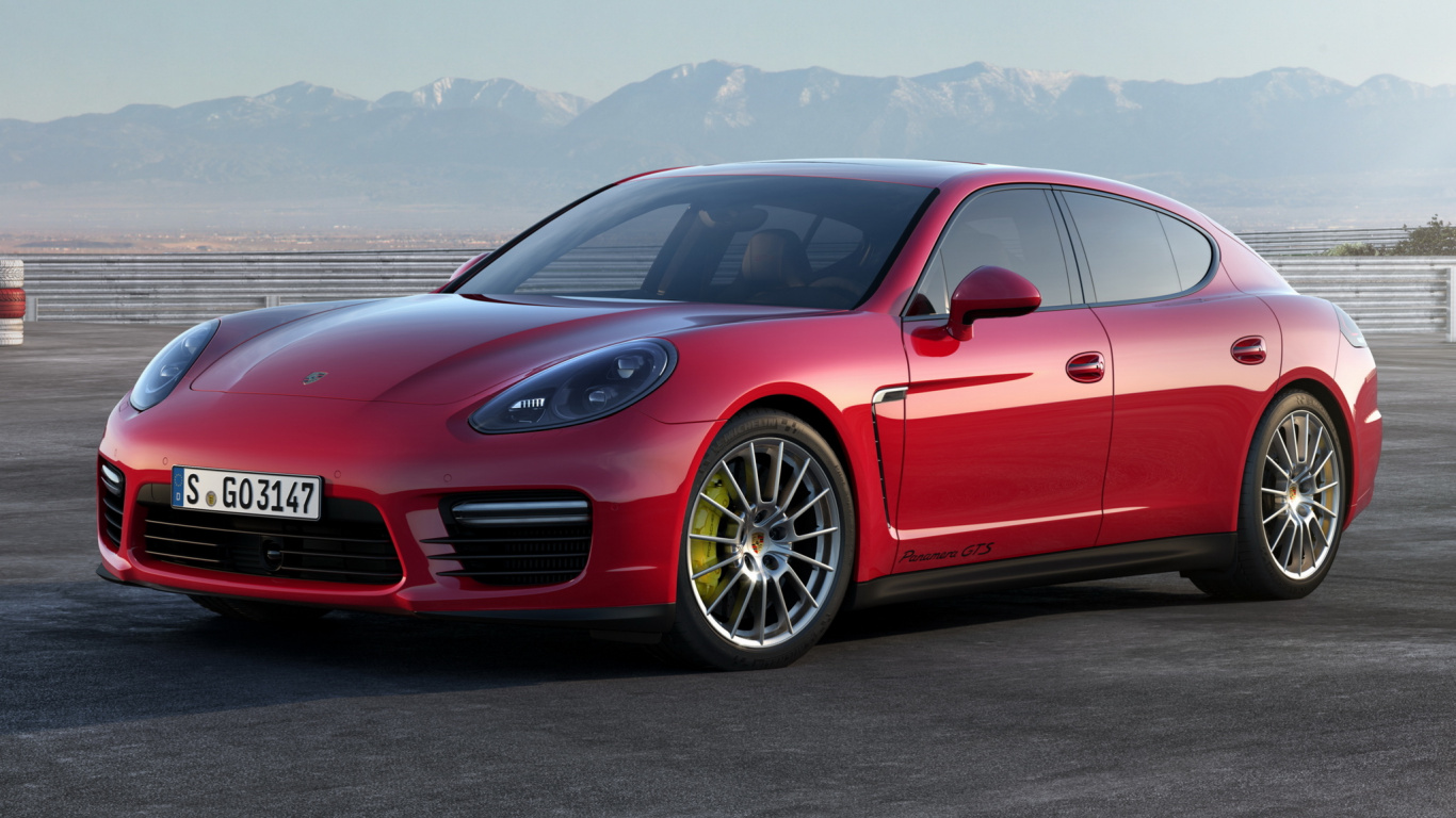 Red Audi Coupe on Gray Concrete Road During Daytime. Wallpaper in 1366x768 Resolution