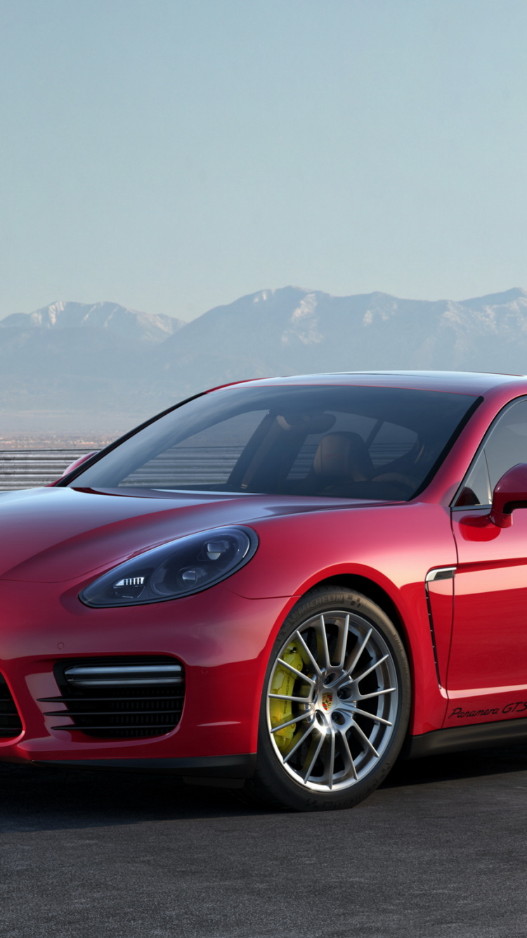 Red Audi Coupe on Gray Concrete Road During Daytime. Wallpaper in 750x1334 Resolution