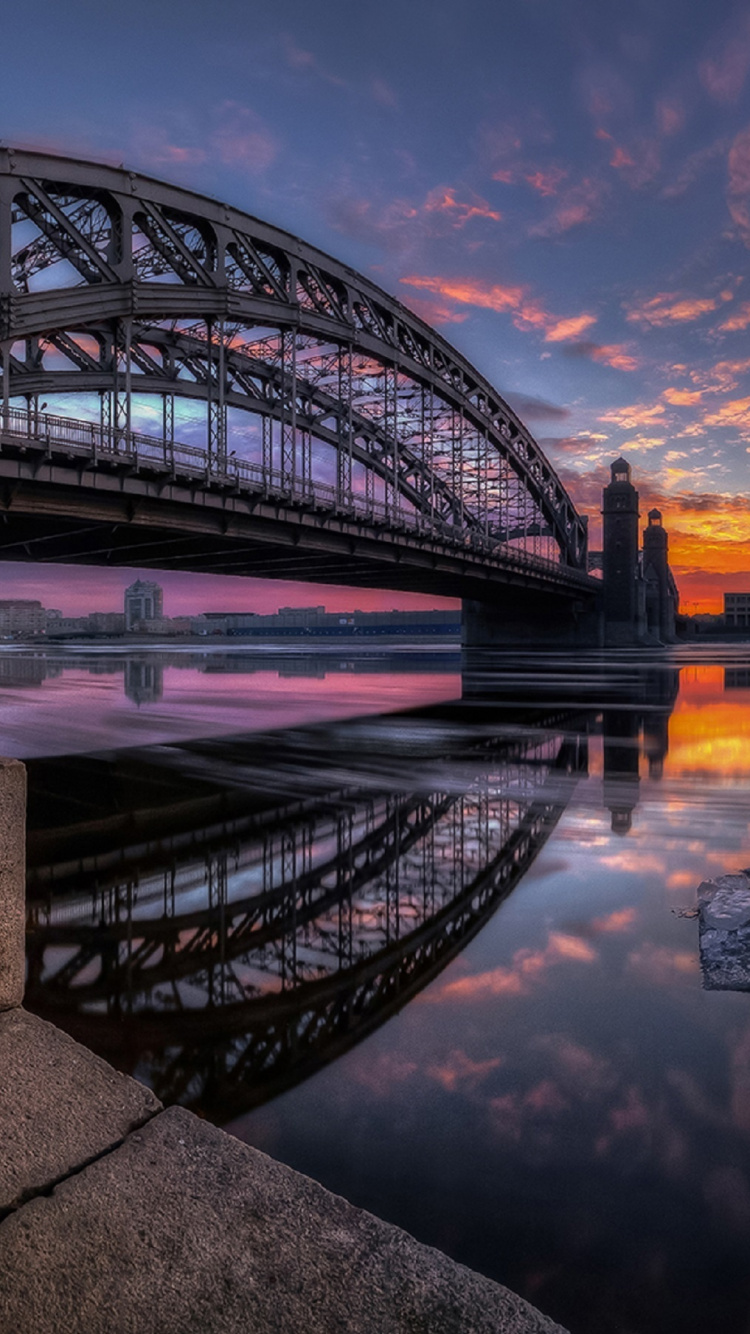 Body of Water Under Blue Sky During Sunset. Wallpaper in 750x1334 Resolution
