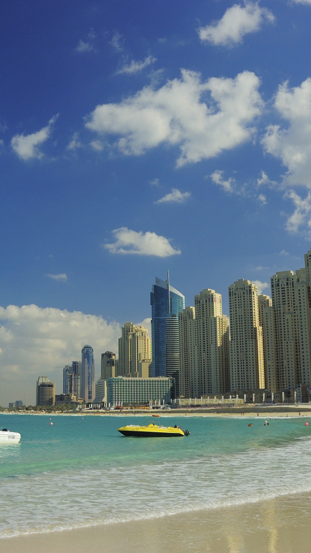 City Skyline Across The Sea During Daytime. Wallpaper in 1080x1920 Resolution