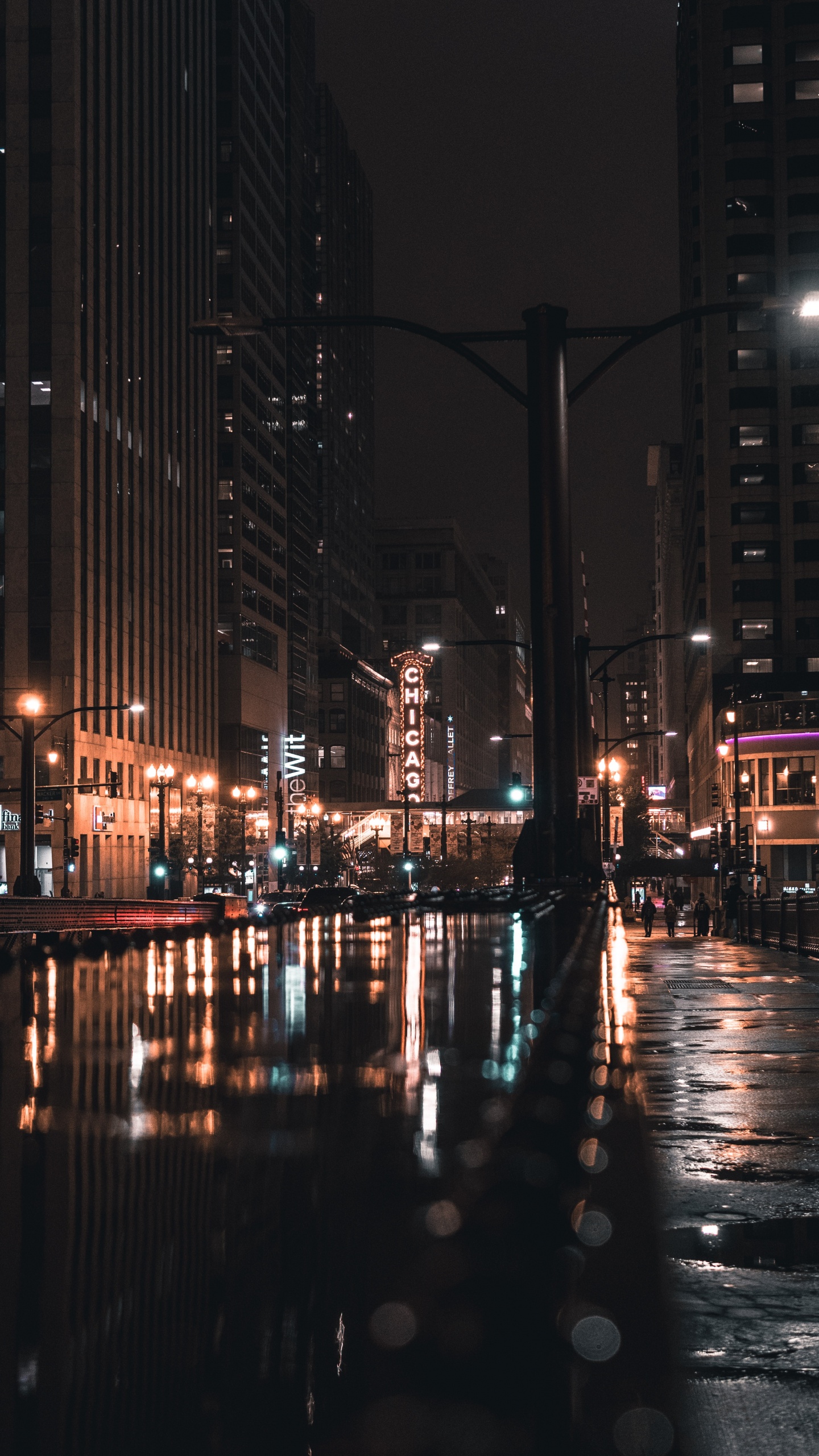 People Walking on Sidewalk During Night Time. Wallpaper in 1440x2560 Resolution