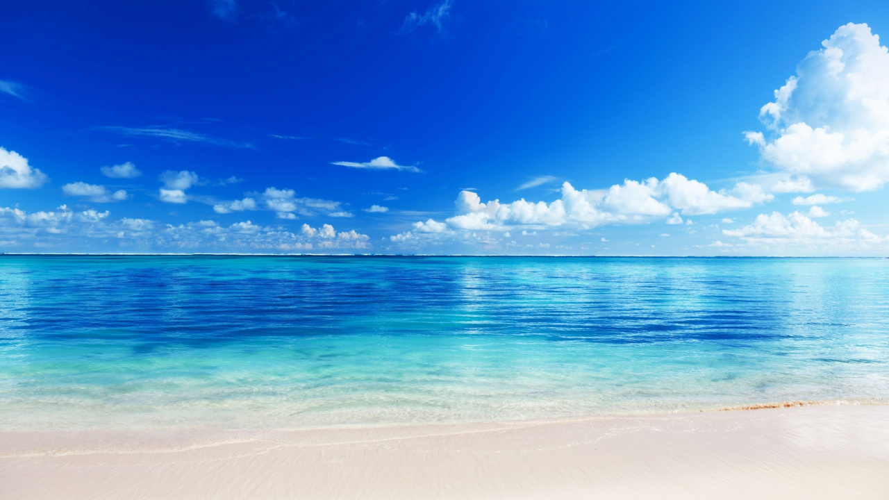 Blue Sea Under Blue Sky During Daytime. Wallpaper in 1280x720 Resolution