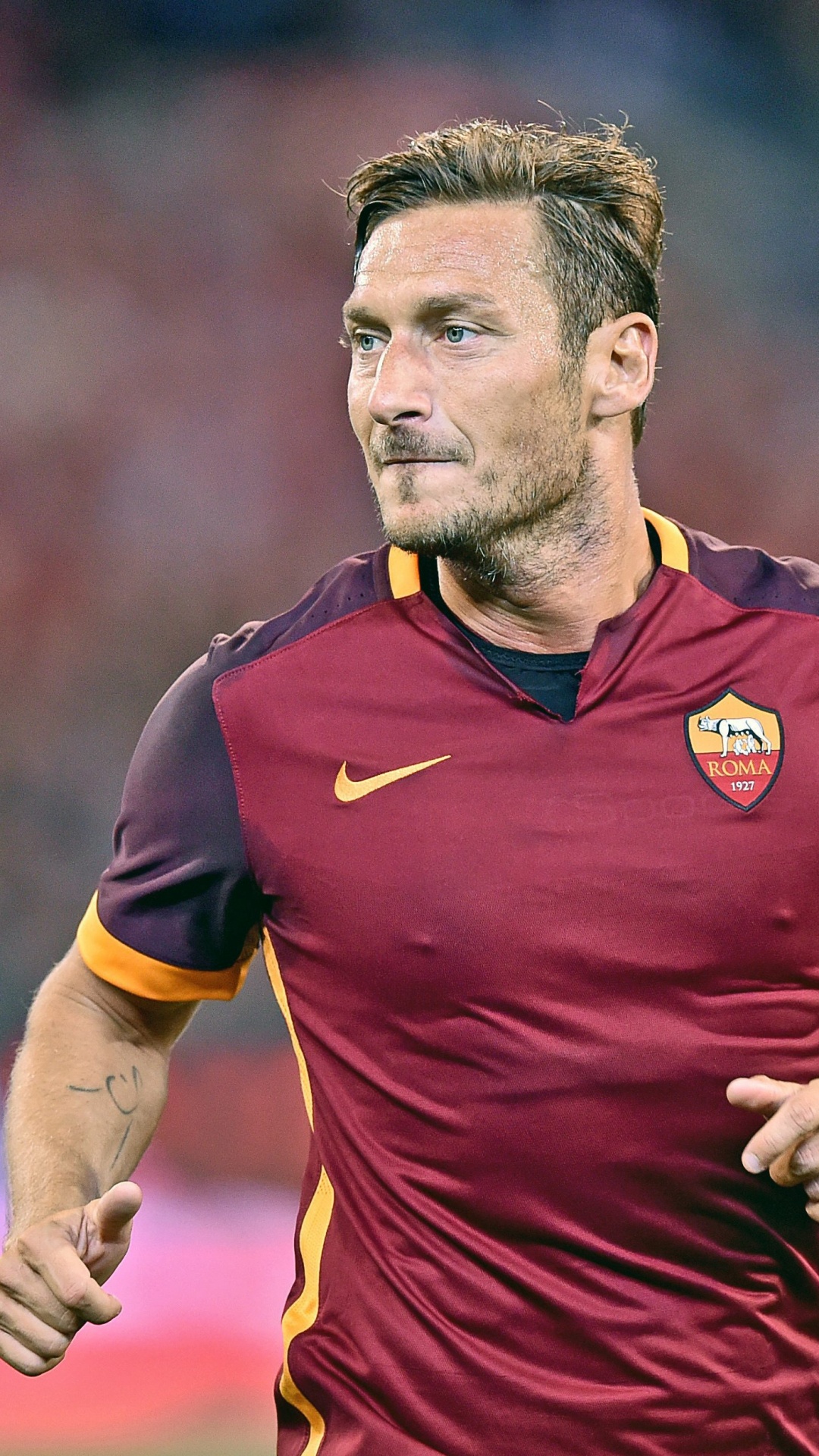 Man in Red and Blue Nike Soccer Jersey. Wallpaper in 1080x1920 Resolution