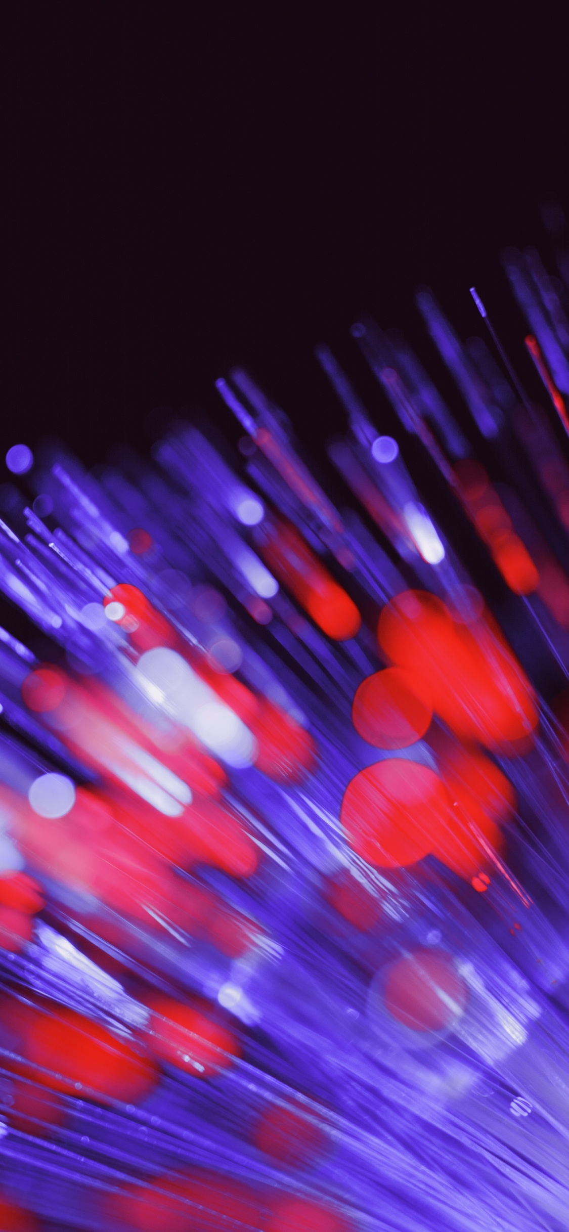 Rotes Und Blaues Licht-Bokeh. Wallpaper in 1125x2436 Resolution