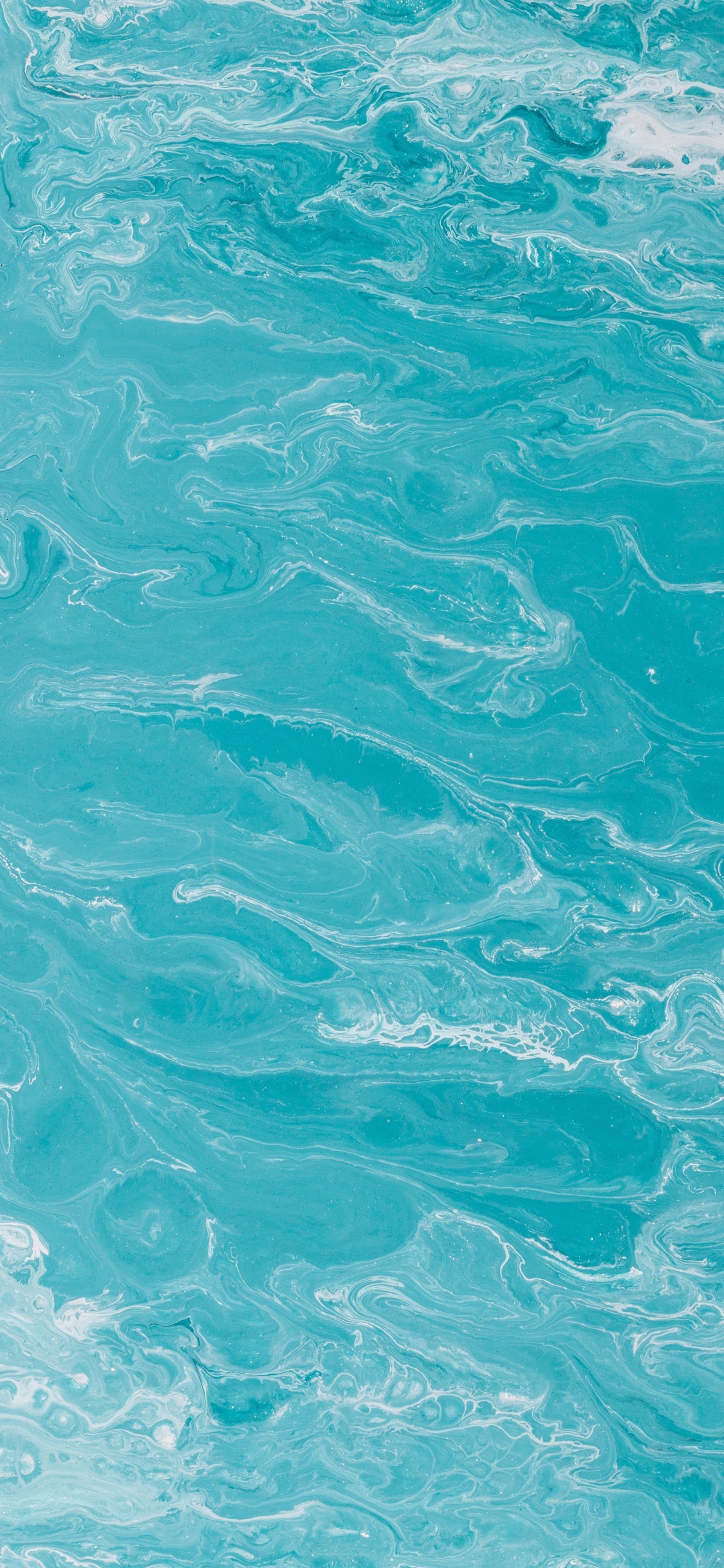 Eau Bleue Avec Des Bulles Blanches. Wallpaper in 1125x2436 Resolution