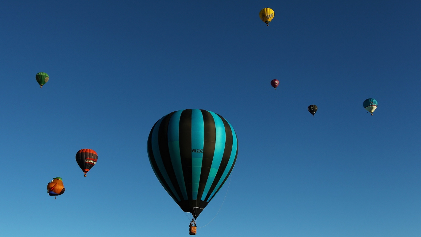 Green Blue and Red Hot Air Balloons. Wallpaper in 1366x768 Resolution