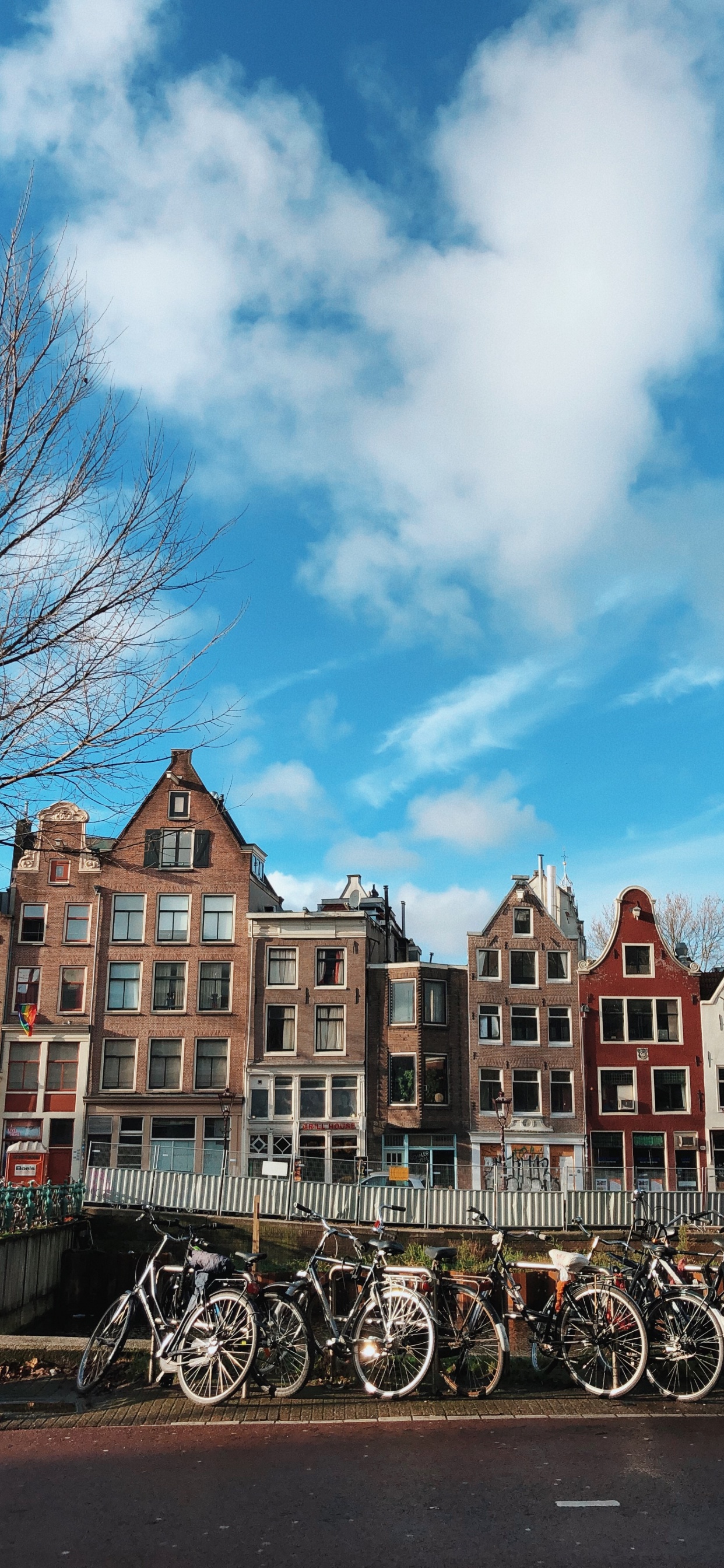 People Walking on Street Near Buildings During Daytime. Wallpaper in 1242x2688 Resolution