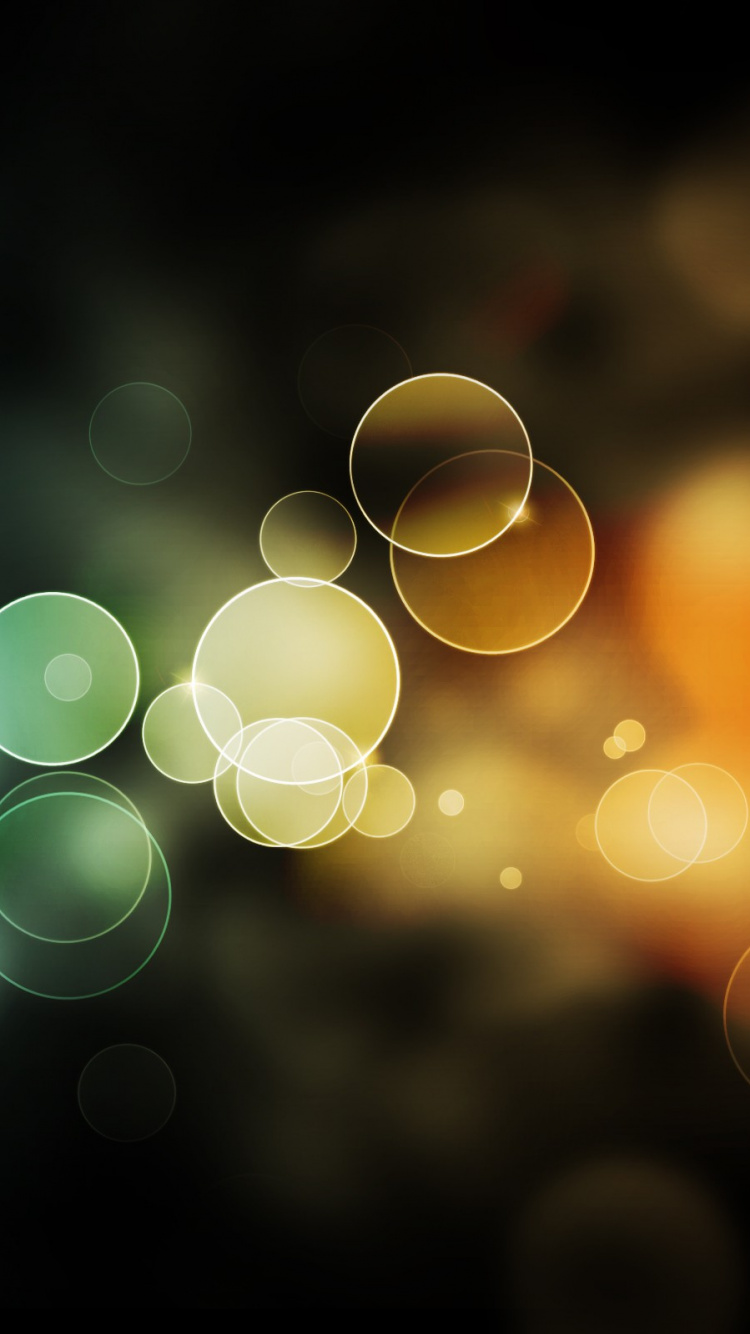 Yellow and Green Bokeh Lights. Wallpaper in 750x1334 Resolution