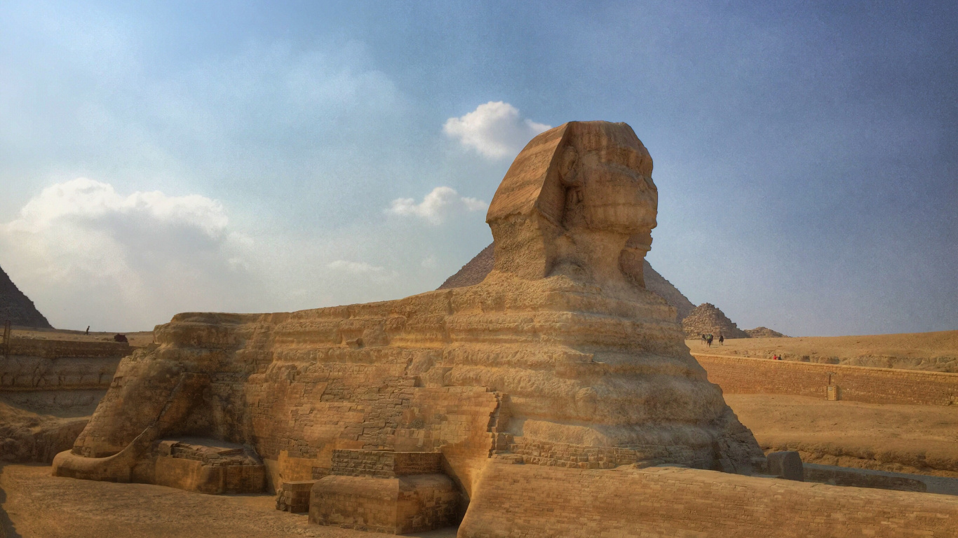 Braune Felsformation Unter Weißen Wolken Tagsüber White. Wallpaper in 1366x768 Resolution