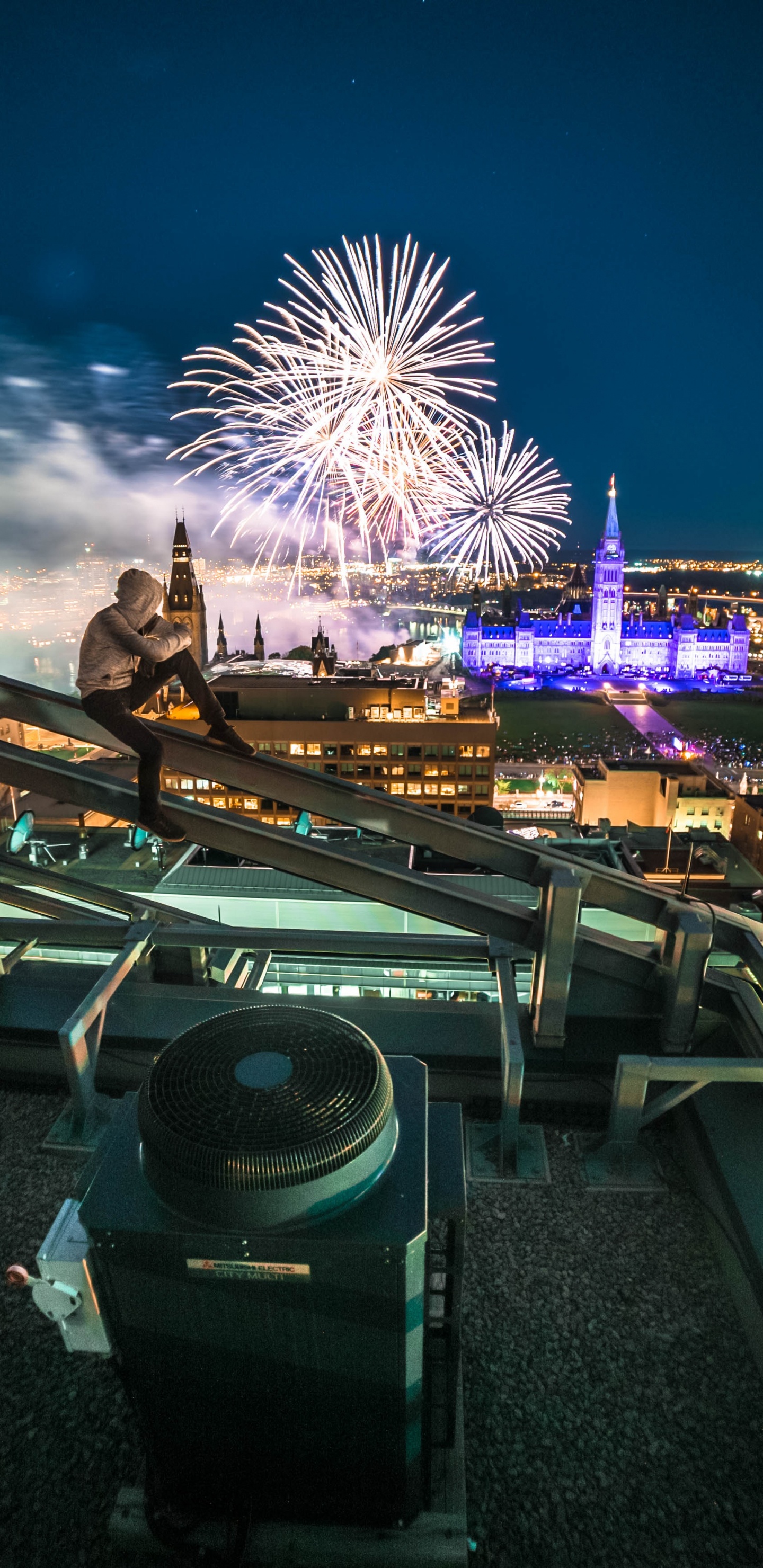 Man in Black Jacket Standing on Top of Building During Night Time. Wallpaper in 1440x2960 Resolution