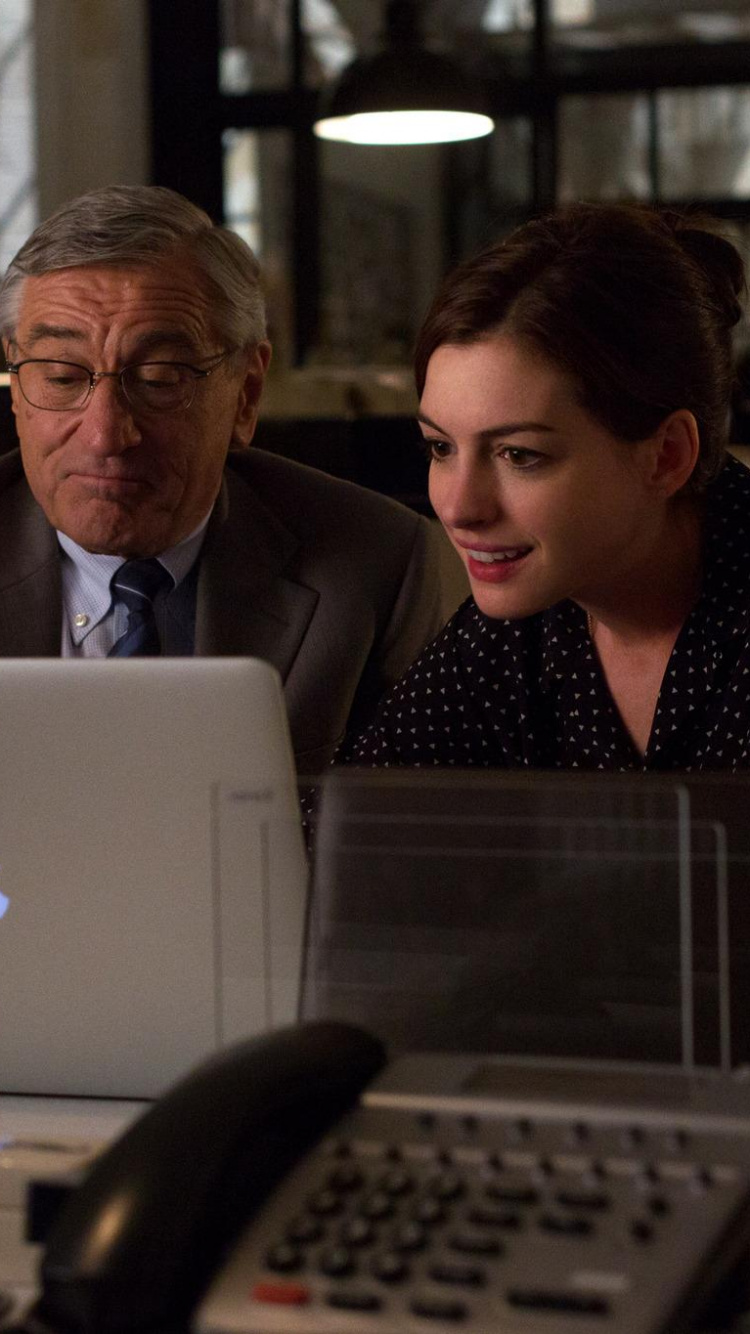 Man in Black Suit Jacket Sitting on Black Office Rolling Chair. Wallpaper in 750x1334 Resolution