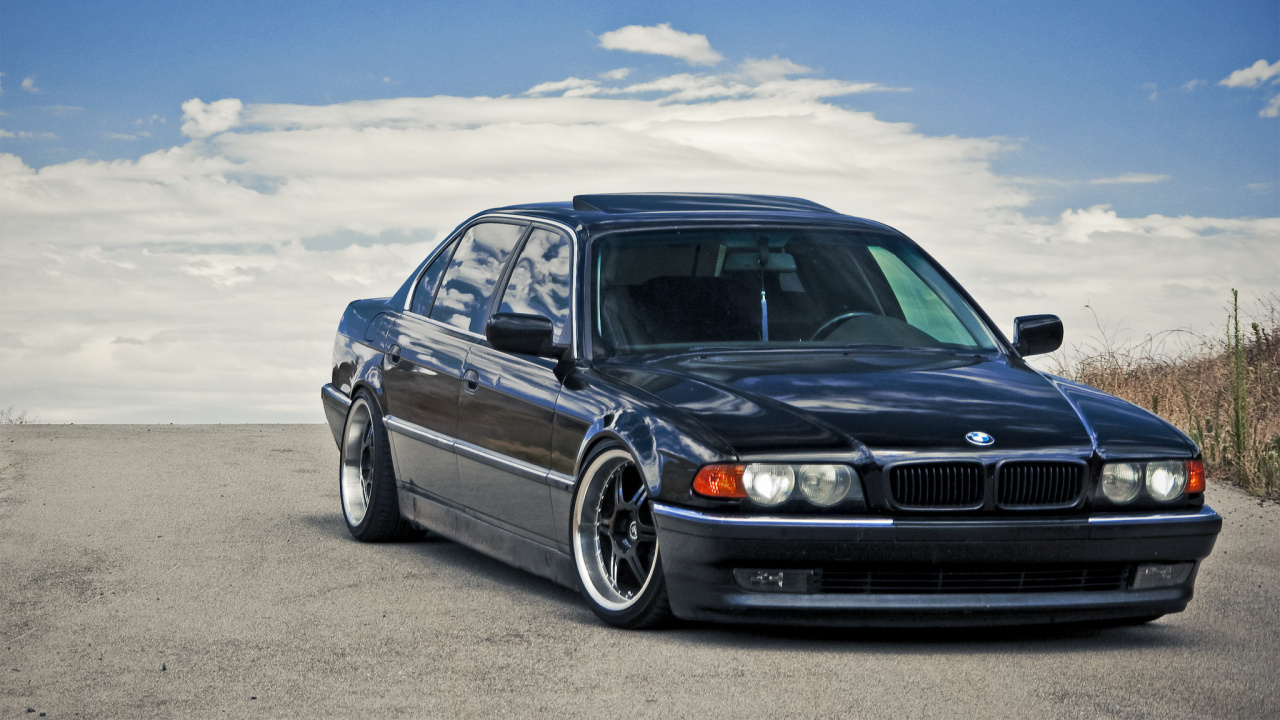 Black Mercedes Benz c Class on Gray Sand During Daytime. Wallpaper in 1280x720 Resolution