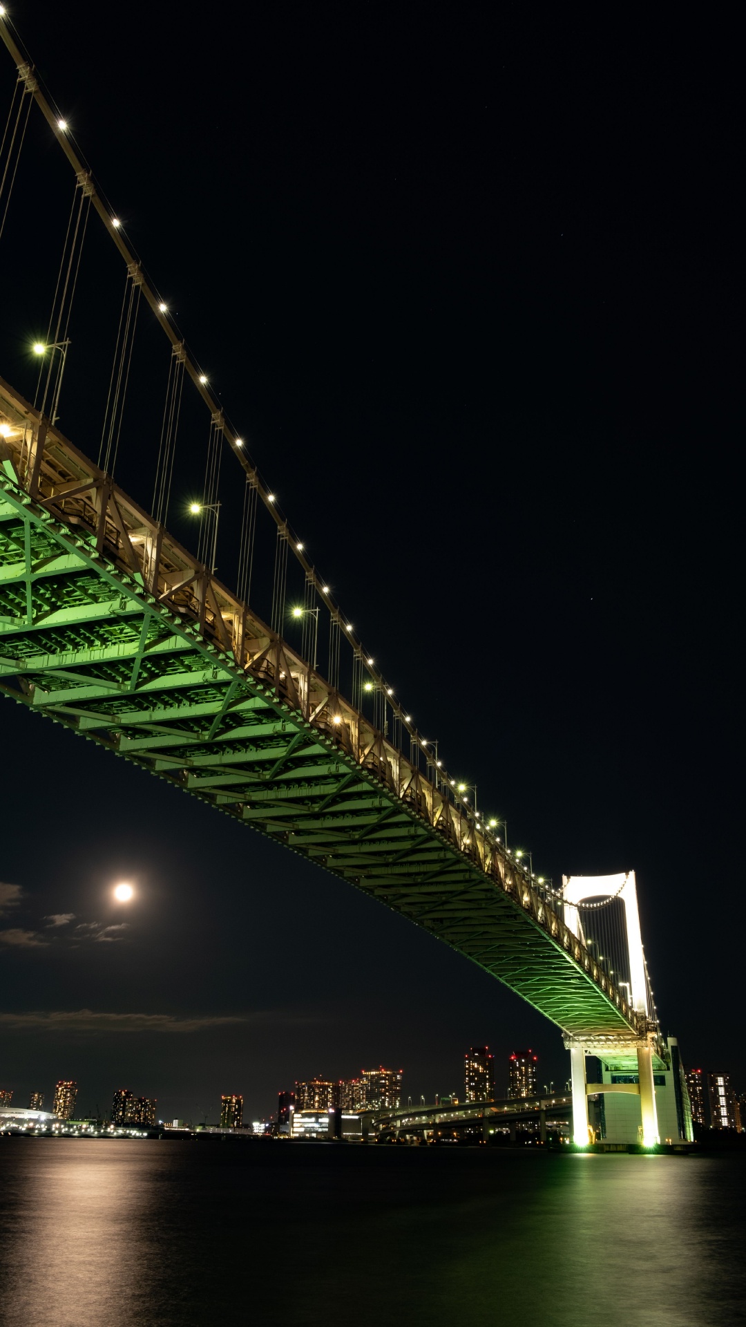Green Bridge With Lights During Night Time. Wallpaper in 1080x1920 Resolution