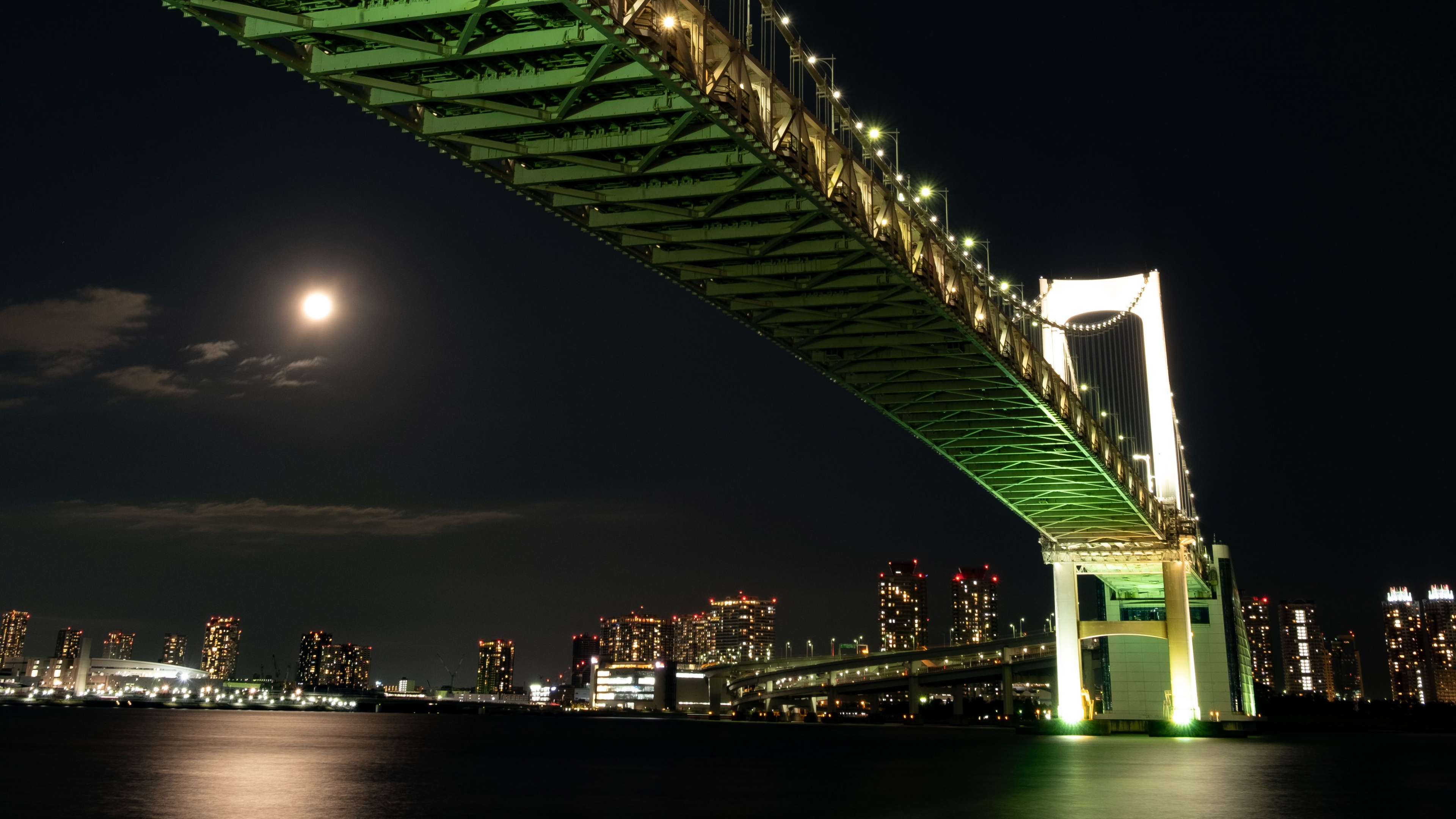 Green Bridge With Lights During Night Time. Wallpaper in 3840x2160 Resolution
